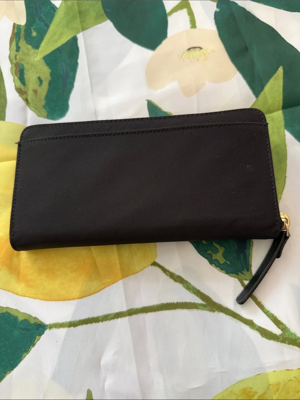 kate spade black zip-around wallet with gold plaque